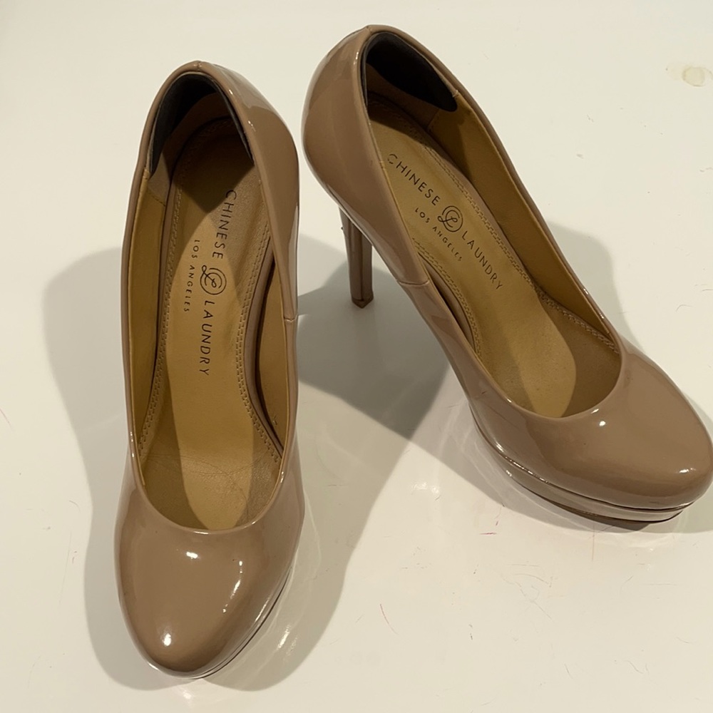 Tan pumps excellent condition.